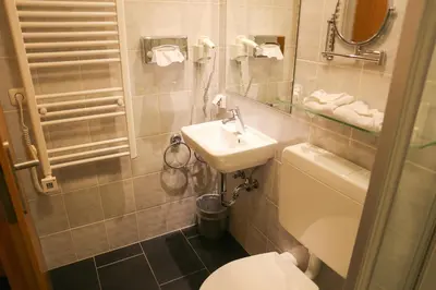 Ein Badezimmer in der Unterkunft Hotel Königer