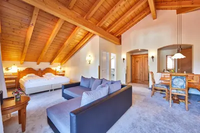 Ein Bett oder Betten in einem Zimmer der Unterkunft Hotel Zugspitze