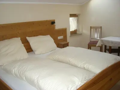 Ein Bett oder Betten in einem Zimmer der Unterkunft Pension Kellerer