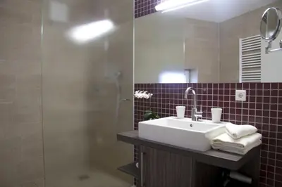 Ein Badezimmer in der Unterkunft Hotel Linner