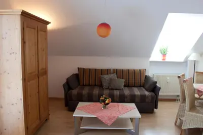 Ein Sitzbereich in der Unterkunft Hotel Linner