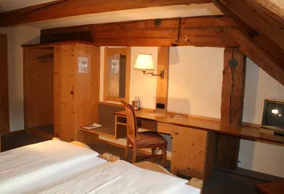 Ein Bett oder Betten in einem Zimmer der Unterkunft Irseer Klosterbräu
