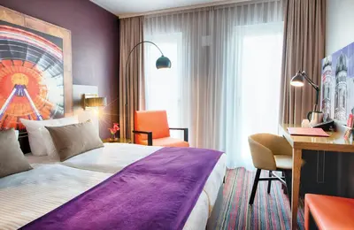 Ein Bett oder Betten in einem Zimmer der Unterkunft Leonardo Hotel Munich City South