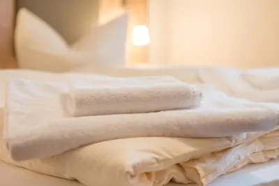 Ein Bett oder Betten in einem Zimmer der Unterkunft Hotel Gasthof Hainzinger