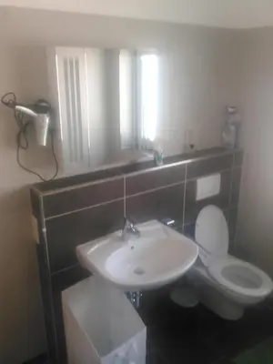 Ein Badezimmer in der Unterkunft Ferienwohnung zum Kletterturm