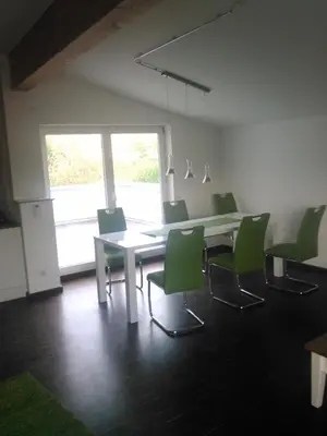 Ein Sitzbereich in der Unterkunft Ferienwohnung zum Kletterturm