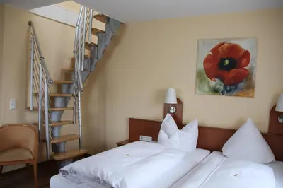 Ein Bett oder Betten in einem Zimmer der Unterkunft Park Residence