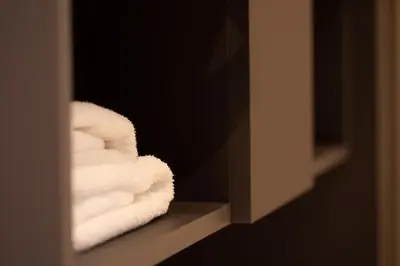 Ein Bett oder Betten in einem Zimmer der Unterkunft Parkhotel Schmid