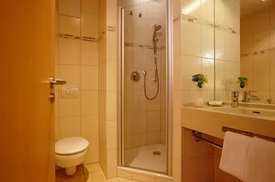 Ein Badezimmer in der Unterkunft Hotel Eberl