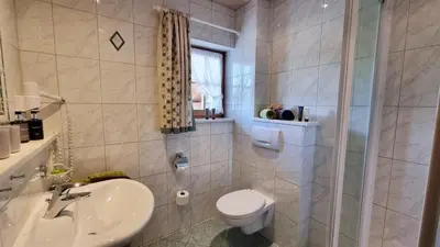Ein Badezimmer in der Unterkunft Gästehaus Alpenparadies