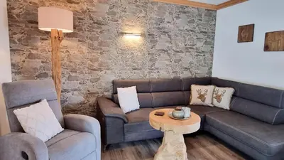 Ein Sitzbereich in der Unterkunft Gästehaus Alpenparadies