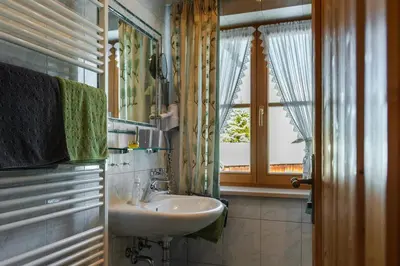 Ein Badezimmer in der Unterkunft Gästehaus Alpenparadies