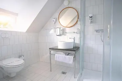 Ein Badezimmer in der Unterkunft Das Schreder Hotel - Munich Free Parking