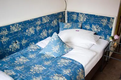 Ein Bett oder Betten in einem Zimmer der Unterkunft das HOTEL in München