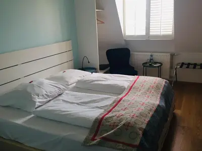 Ein Bett oder Betten in einem Zimmer der Unterkunft das HOTEL in München