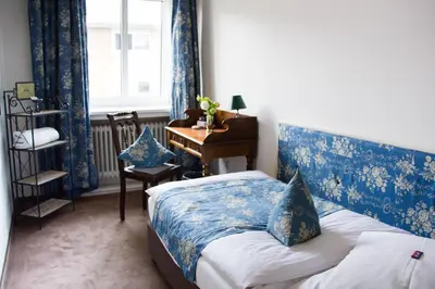 Ein Bett oder Betten in einem Zimmer der Unterkunft das HOTEL in München