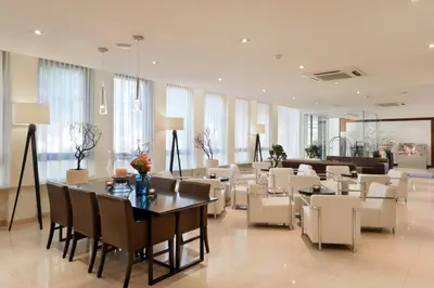 Ein Sitzbereich in der Unterkunft ACHAT Hotel München Süd