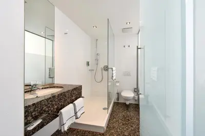 Ein Badezimmer in der Unterkunft ACHAT Hotel München Süd