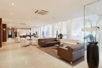 Ein Sitzbereich in der Unterkunft ACHAT Hotel München Süd