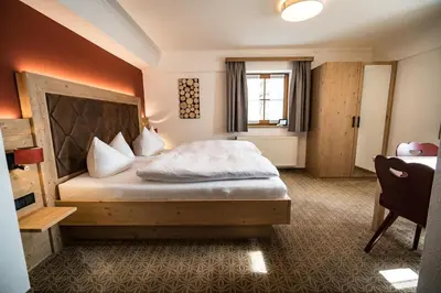 Ein Bett oder Betten in einem Zimmer der Unterkunft Hohenester Gasthaus & Hotel