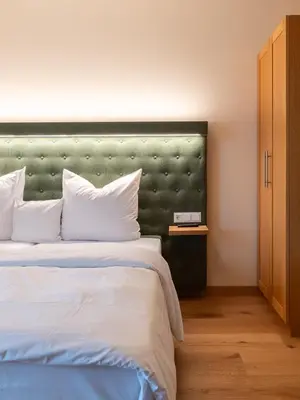 Ein Bett oder Betten in einem Zimmer der Unterkunft Gutshotel Odelzhausen