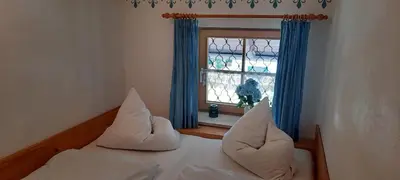 Ein Bett oder Betten in einem Zimmer der Unterkunft Zum Heisn