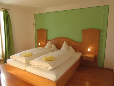 Ein Bett oder Betten in einem Zimmer der Unterkunft Zum Heisn