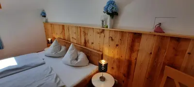 Ein Bett oder Betten in einem Zimmer der Unterkunft Zum Heisn