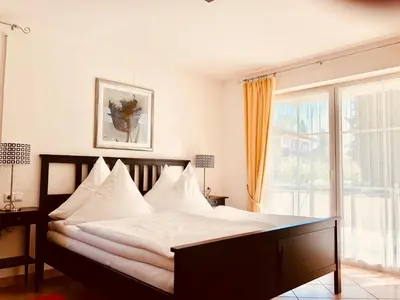 Ein Bett oder Betten in einem Zimmer der Unterkunft Ferienwohnungen Birkenhof