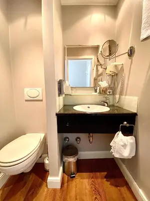 Ein Badezimmer in der Unterkunft Das Nikolai Hotel