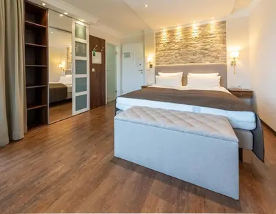 Ein Bett oder Betten in einem Zimmer der Unterkunft ChiemseeStern Vacation & Recreation 