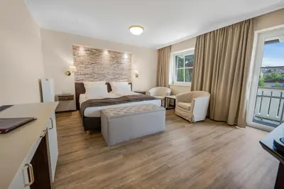 Ein Bett oder Betten in einem Zimmer der Unterkunft ChiemseeStern Vacation & Recreation 