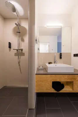 Ein Badezimmer in der Unterkunft mk | hotel münchen city