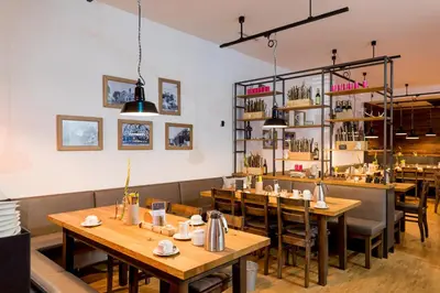 Ein Restaurant oder anderes Speiselokal in der Unterkunft mk | hotel münchen city