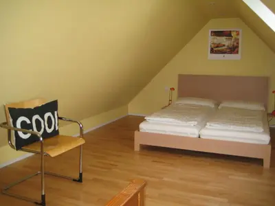 Ein Bett oder Betten in einem Zimmer der Unterkunft Country and Town