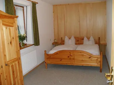 Ein Bett oder Betten in einem Zimmer der Unterkunft Gasthaus - Pension - Café Dörfl