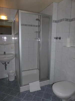 Ein Badezimmer in der Unterkunft Gasthaus - Pension - Café Dörfl