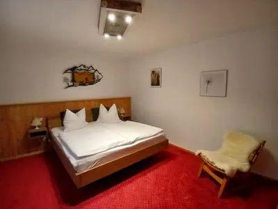 Ein Bett oder Betten in einem Zimmer der Unterkunft Gasthaus - Pension - Café Dörfl