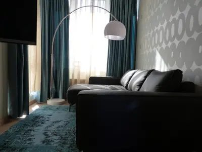 Ein Sitzbereich in der Unterkunft Parkhotel Heidehof Apartements