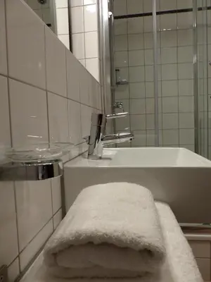 Ein Badezimmer in der Unterkunft Parkhotel Heidehof Apartements