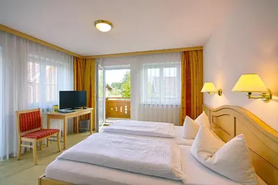 Ein Bett oder Betten in einem Zimmer der Unterkunft Gasthof 