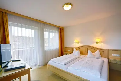Ein Bett oder Betten in einem Zimmer der Unterkunft Gasthof 