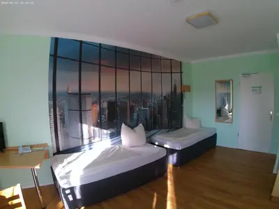 Ein Bett oder Betten in einem Zimmer der Unterkunft Hotel Thannhof