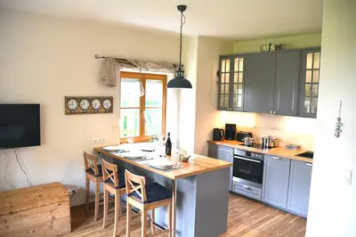 Küche/Küchenzeile in der Unterkunft Chiemsee Beachhouse Apartment