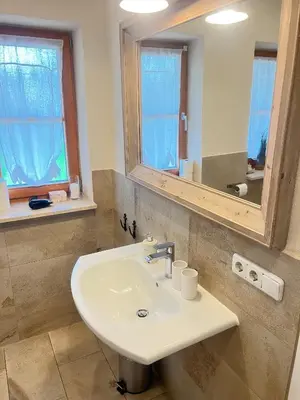 Ein Badezimmer in der Unterkunft Chiemsee Beachhouse Apartment
