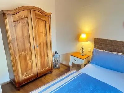 Ein Bett oder Betten in einem Zimmer der Unterkunft Chiemsee Beachhouse Apartment