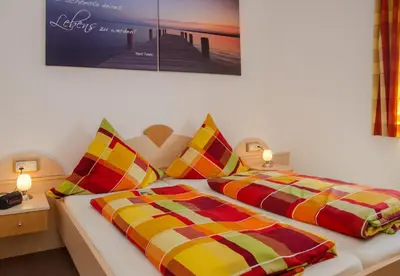 Ein Bett oder Betten in einem Zimmer der Unterkunft Hotel-Cafe Hanfstingl