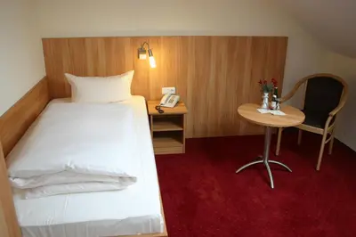 Ein Bett oder Betten in einem Zimmer der Unterkunft Hotel Accolo