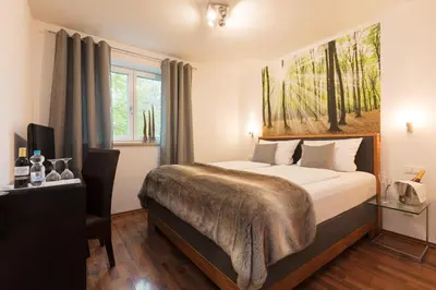 Ein Bett oder Betten in einem Zimmer der Unterkunft Hotel Villa Rosa