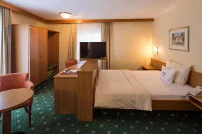Ein Bett oder Betten in einem Zimmer der Unterkunft Chalét zum Kurfürst